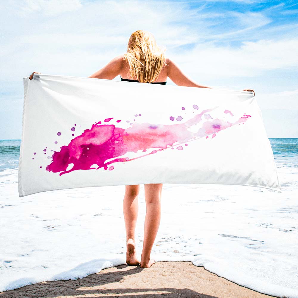 pink long island watercolor beach towel woman beach holding horizontally